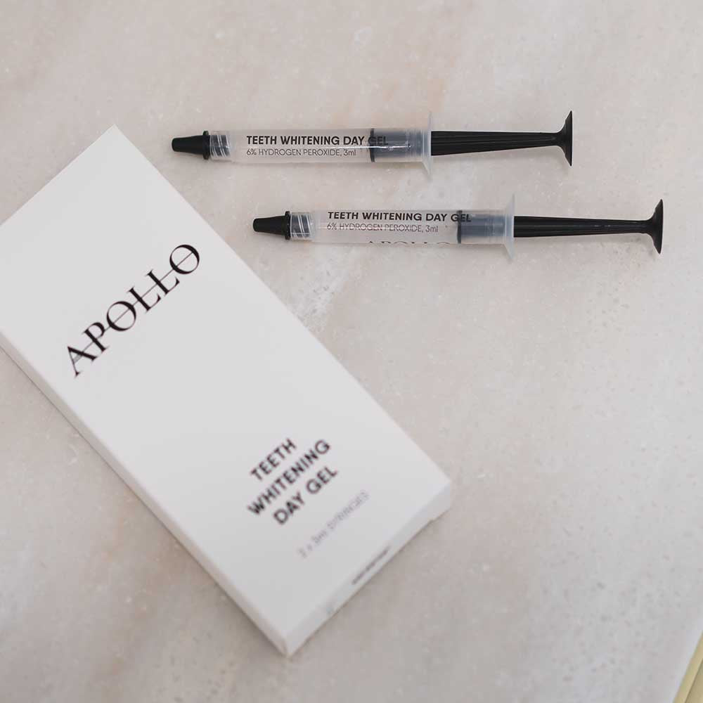 Apollo teeth whitening day gel with two syringes on a light background